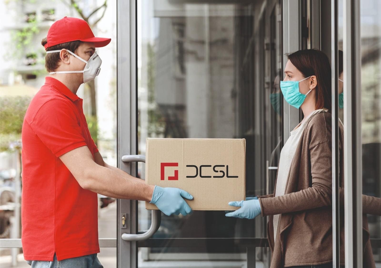 Delivery driver handing a package to a customer at the doorstep