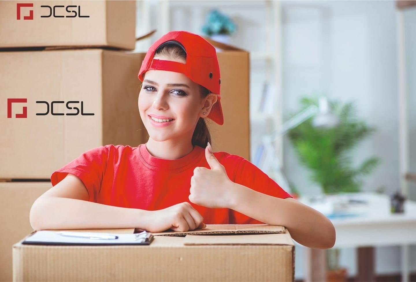 Woman preparing parcels for delivery